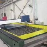 Exciter beam assembly machine